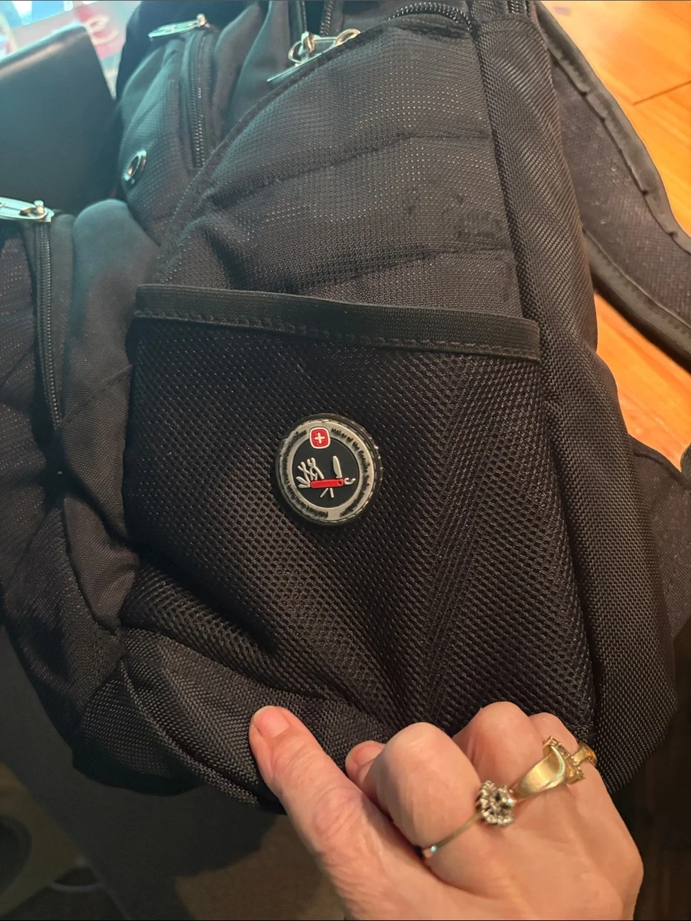 SwissGear Black Backpack with Red Logo - Multi-Compartment Men's Daypack